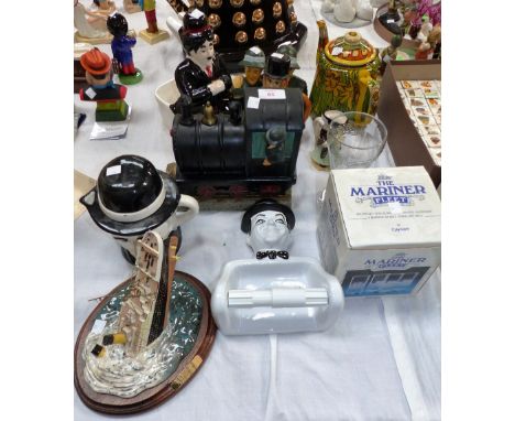 A Charlie Chaplin teapot; toilet brush and toilet paper holder; a Peggy Davies jug, boxed; a ceramic Titanic model; decorativ