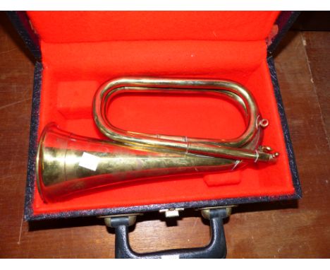A brass bugle by Barratts of Manchester, in case