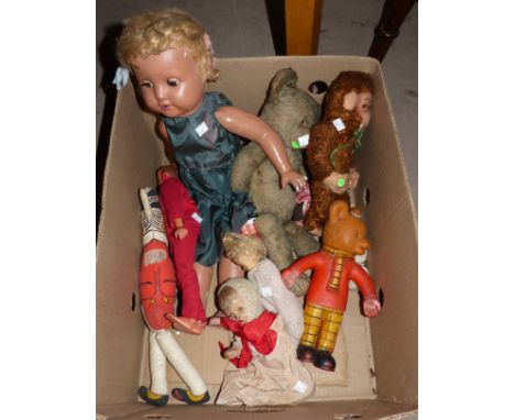 A selection of early to mid 20th century toys including a composition doll; a Steiff style teddy bear; Rupert Bear; etc. 