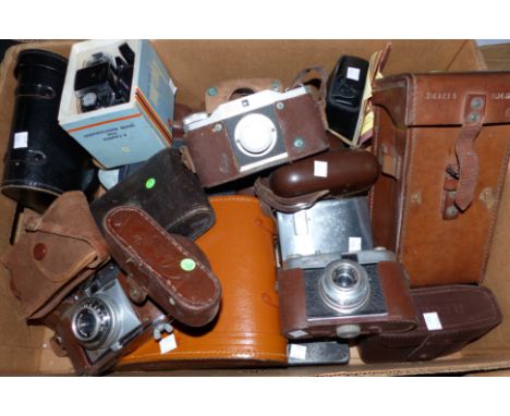 A selection of vintage cameras; binoculars; etc.