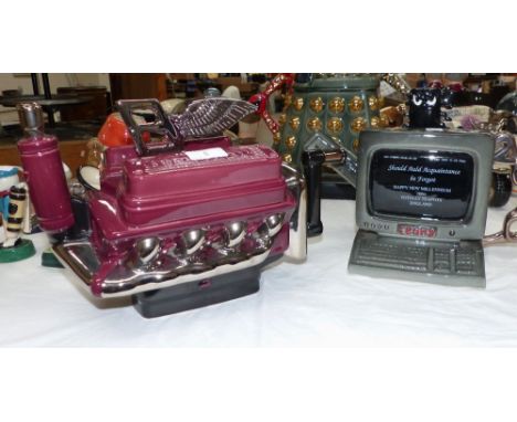 A novelty teapot:  Bentley Engine Block "Tea & Turbo Charged"; a similar Totally Teapots limited edition "Domesday" teapot (l