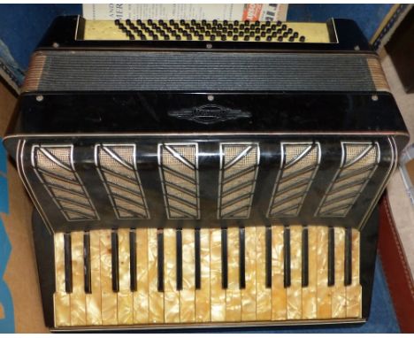 An 80 base piano accordion by Ranner, in case
