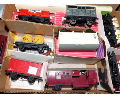 Eight various railway wagons/trucks including a grey GWR cattle truck 8T; a tank wagon "Mobil"; etc., 5 boxed