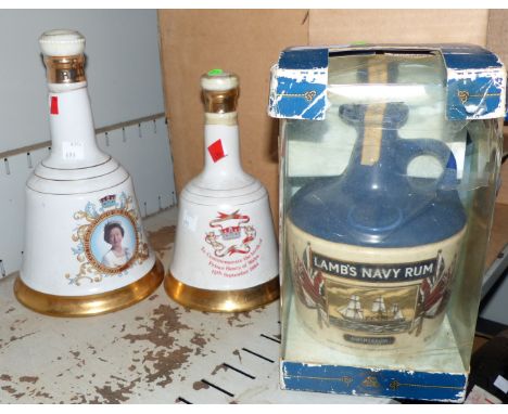 A Lamb's Navy rum "HMS Warrior" decanter and contents; 2 Wade Bell's Royal Commemorative decanters and contents