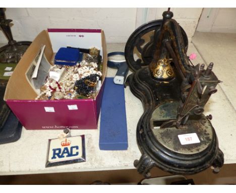 A vintage sewing machine; a quantity of collectables and jewellery