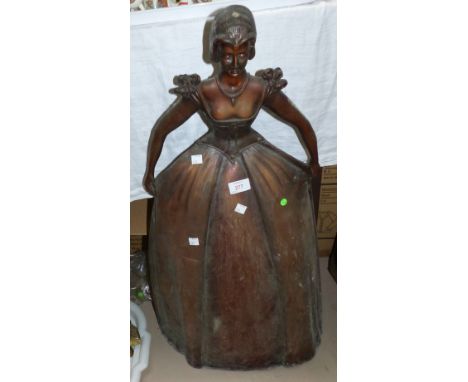 A 19th century copper firescreen in the form of a crinoline lady, circa 1930's; a 19th century stained rosewood cane seat mus