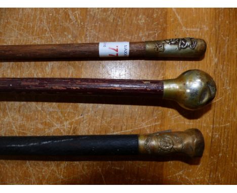 A Hampshire Regiment swagger stick; and 2 others