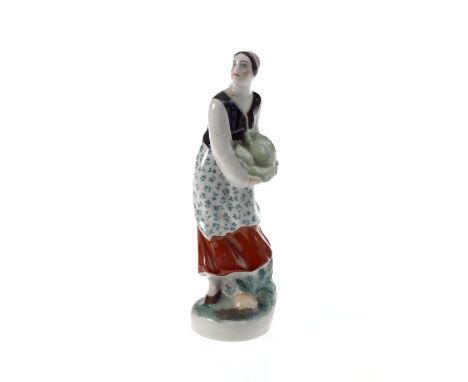  A Porcelain Figurine of a Woman Carrying a Cabbage  AFTER A MODEL BY NATALIA DANKO, LOMONOSOV STATE PORCELAIN MANUFACTORY, L