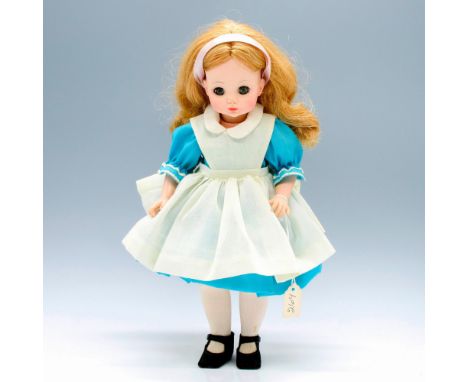 Original replica of an adorable Alice through the looking glass doll. This collector's item features Alice in her iconic blue