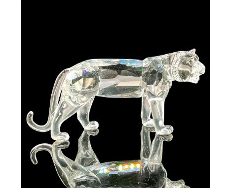 This highly crafted figurine sparkles with brilliance and showcases the majesty of the tiger with its black eyes and clear cr