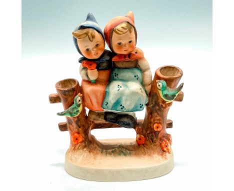 Hummel Figurine #179; Matte porcelain, hand painted. Two young girls sitting on a fence with birds. 'M. I. Hummel' inscribed 