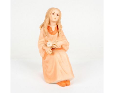 Designed by world renowned sculptor. Features a young woman in peach toned coloration seated with a feline on her lap. Artist