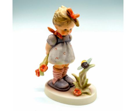 Exclusive Edition Hummel Figurine #450/0; Matte porcelain, hand painted. Young girl holding a flower and looking at a bumble 