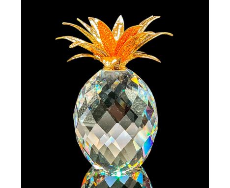 This sophisticated pineapple is made from faceted sparkling crystal adorned with hammered gold leaf for a touch of glamour an