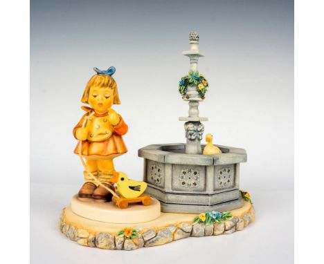 Limited edition hand painted in matte finish made to be displayed atop Towne Square base. Hummel M. I. Hummel impressed backs