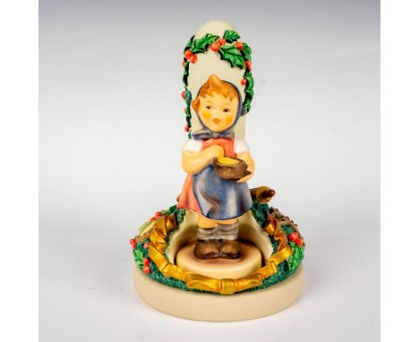 Hand painted in matte finish, adorable figurine with unique cookie press display stand. M. I. Hummel impressed backstamp. Goe