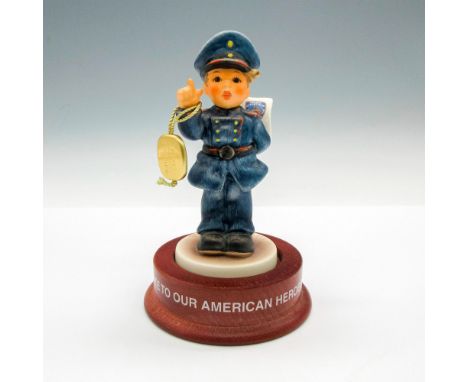 Figural in police blue uniform holding NYPD paper. Limited edition 3155 of 5000. NYC Police Foundation. Goebel Hummel tag - T
