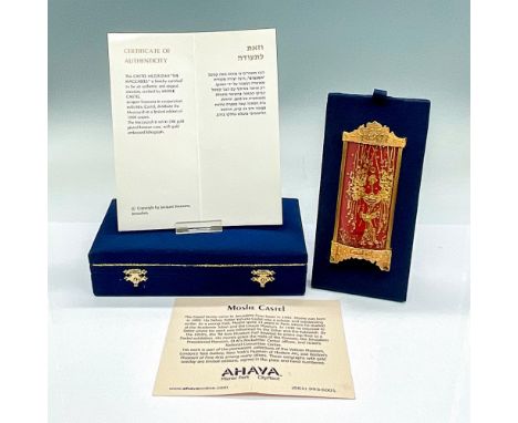 This Castel Mezuzah consists of a gold embossed lithograph encased in a 24 karat gold plated brass frame and designed in the 