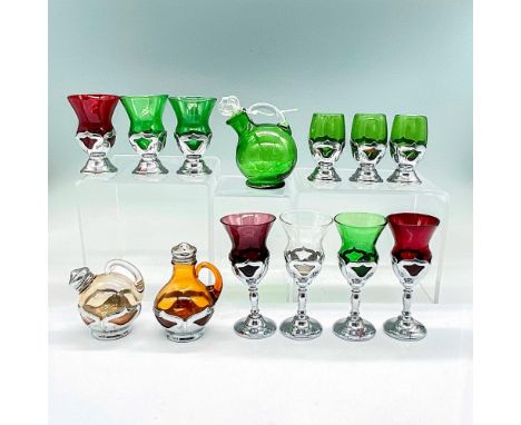Krome Kraft glass in silver plated frame holders. Mini pitcher with stopper 3"L x 2.25"W x 3.5"H. Ten cordial glasses in vari