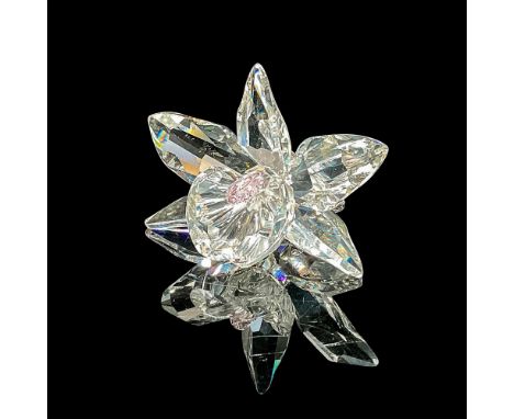 This dazzling pink orchid was part of the â€œExquisite Accentsâ€ theme group. Introduced in 1998, this clear crystal piece wi