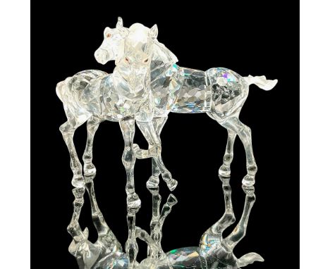 These crystal foals were part of the â€œPeaceful Countrysideâ€ theme group. Depicted are two baby horses playfully prancing a