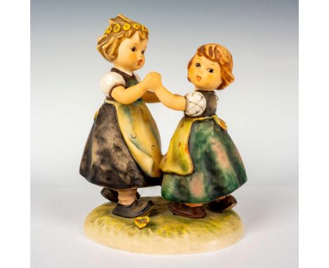Hand painted in matte finish modeled as two girls dancing. M. I. Hummel impressed backstamp. Goebel backstamp. Issued: 20th c