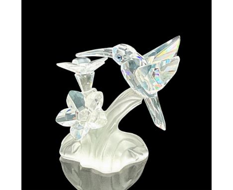 Part of the 'Among Flowers and Foliage' collection. Clear faceted bird and flowers on a frosted base. Swarovski marking. This