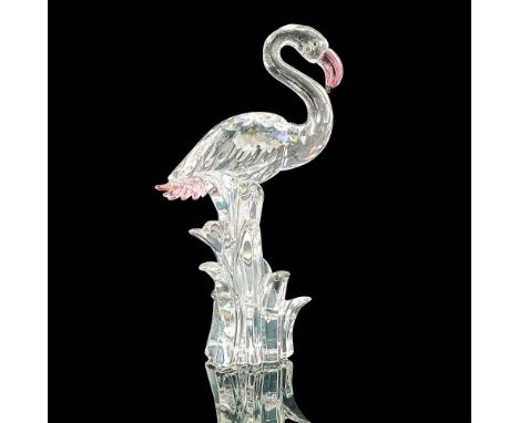 This well-crafted figurine was part of the â€œFeathered Beautiesâ€ collection, it captures the elegant flamingo, as it wades 