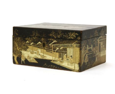 A 19th century Chinese export lacquer tea caddy, the interior with a lidded 7in compartment, 20.5cm wide