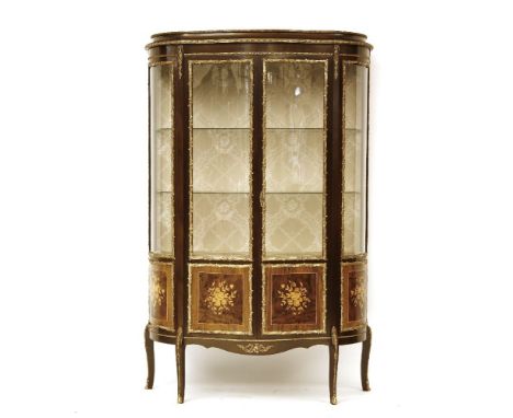 A Louis XVI design inlaid vitrine fitted pair of shaped, glazed panel doors with inlaid floral marquetry panels below, enclos