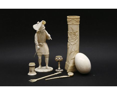 A 19th century Chinese ivory figure, a 19th century ivory egg, and ivory spoon and miniature cup, a 19th century bone vessel 