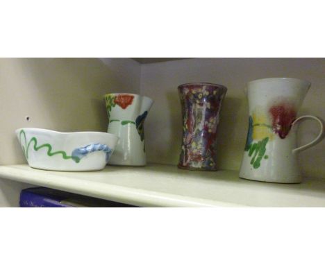 Janice Tchalenko pottery, viz. two jugs; a square dish; and a waisted vase, decorated in abstract designs  2''h-7''h        O