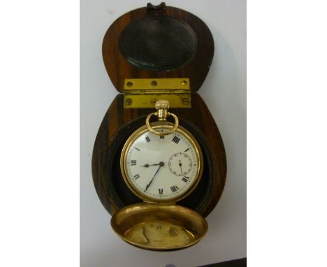 A 9ct gold cased full hunter pocket watch, the keyless movement faced by a white enamel Roman dial with subsidiary seconds; a