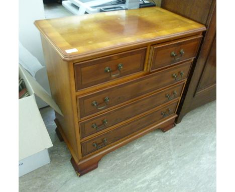 A modern yew wood finished five drawer dressing chest, raised on bracket feet  30''h  28''w       LAB