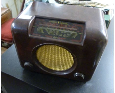 A mixed lot: to include a 1930s Bush Bakelite wireless  9''h  12''w; and various woodworking tools        BSR