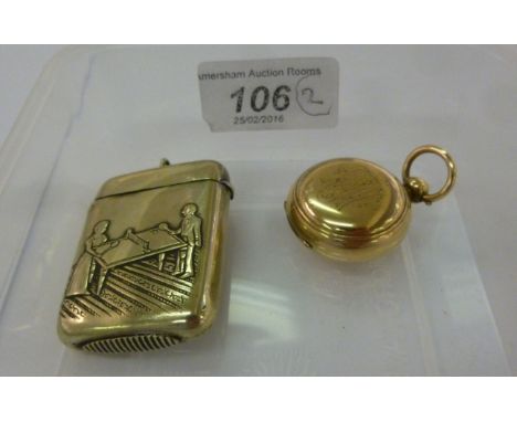 A white metal vesta case, decorated with a couple playing table tennis; and a rolled gold sovereign case       11