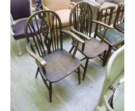 A pair of late 19thC beech and elm framed hoop and stick back Windsor open arm chairs, raised on ring turned, tapered legs, u