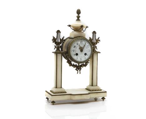 An alabaster and gilt metal mantel clock 19th century, French, surmounted by an urn, to an enamel dial with Arabic numerals, 