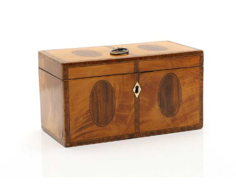 A George III mahogany and satinwood tea caddy  the crossbanded top with a silver handle, London 1798, opening to reveal three