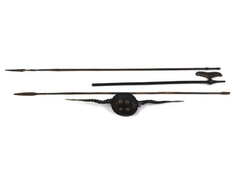 A Tourag sword,  with a shaped blade, with a knotted rib design to the centre, a wood handle,  47.5cm long; together with an 