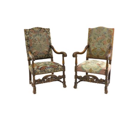 A pair of walnut armchairs upholstered in a tapestry style fabric,65cm wide66cm deep118cm highCondition ReportKnocks and wear
