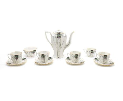 A Shelley 'Bunches of Grapes' porcelain tea service c.1930, in the Queen Anne shape, comprising a coffee pot, 20cm high, a su