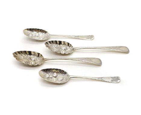 A pair of silver berry spoons mid to late 18th century, by Ebenezer Coker, London,20.2cm long,together with a similar pair of