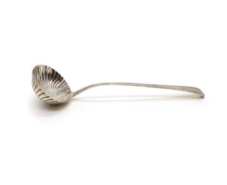 A George III silver soup ladle, by William Eley, William Fearn &amp; William Chawner, London 1809, with a shell form bowl, 32