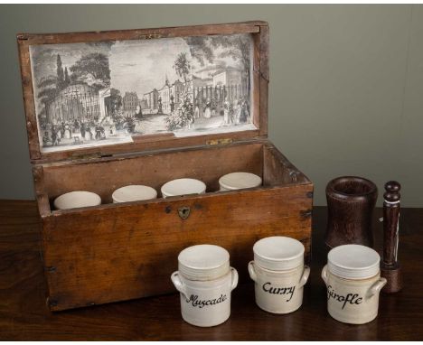 Seven ceramic spice jars, each 8cm in height in a 19th century fruitwood box, 34cm wide