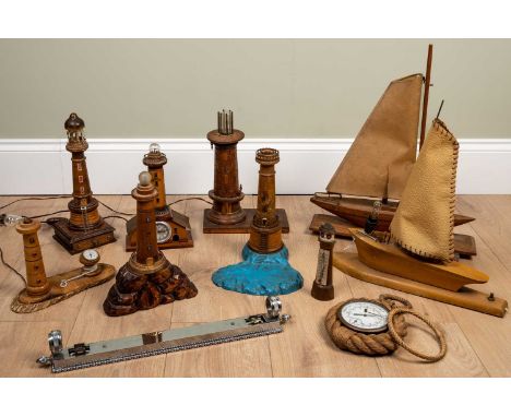 Eight various nautical novelty table lamps, and a thermometer, a barometer and a part wall light, the largest boat 41cm long 