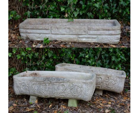 A pair of cast reconstituted stone rectangular toughs with serpentine fronts, decorated with figures and foliate scrolls, eac