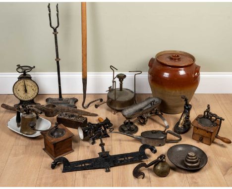 A group of antique cooking utensils to include hand mills, a set of Salter household scales number 46, a Spong &amp; Co coffe