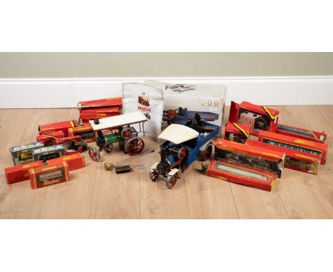 A Mamod steam wagon in original box; together with a Mamod steam tractor; a quantity of Hornby track and railway furniture; a