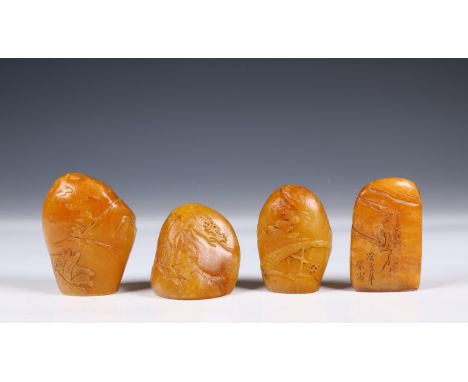 China, four shoushan soapstone seals/ paperweights, each of various boulder shape and carved with figures (some wear) h. 4,5-